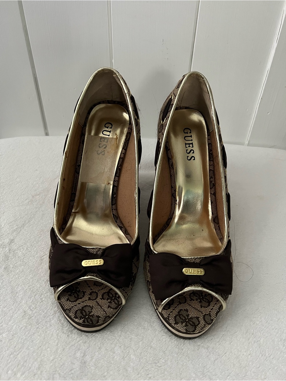 GUESS Brown Lace Logo Peep-Toe Heels with Bow and Gold Accents